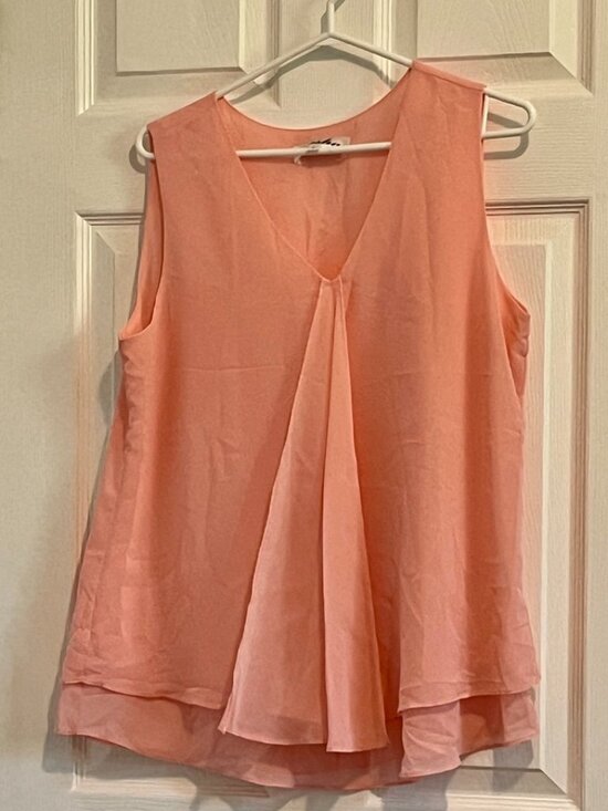 Pasha Tops - Light weight flowy peach sleeveless blouse with front ruffle